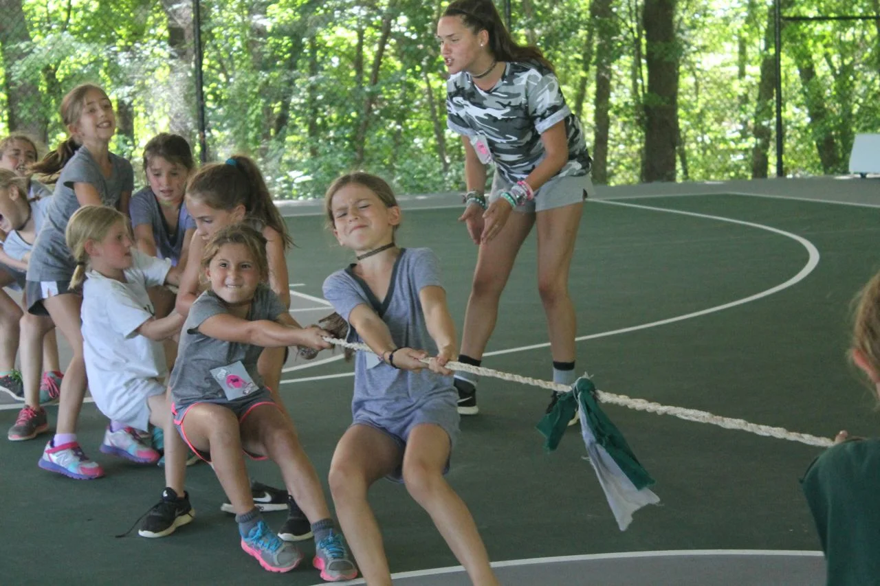 Grey Juniors and Jinters throw their weight into Tug of War. 