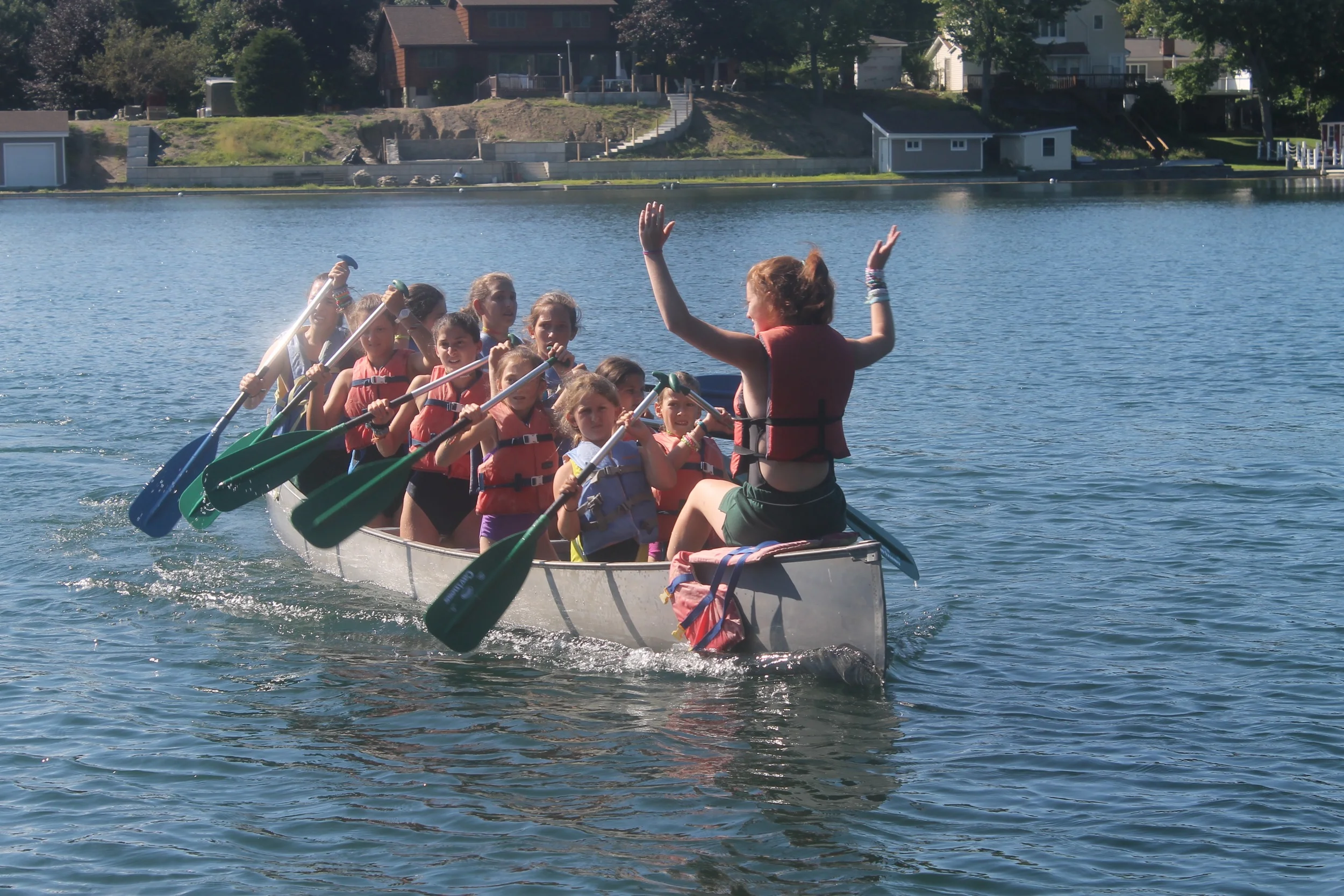 Erica Smiley leads Green War Canoe. 