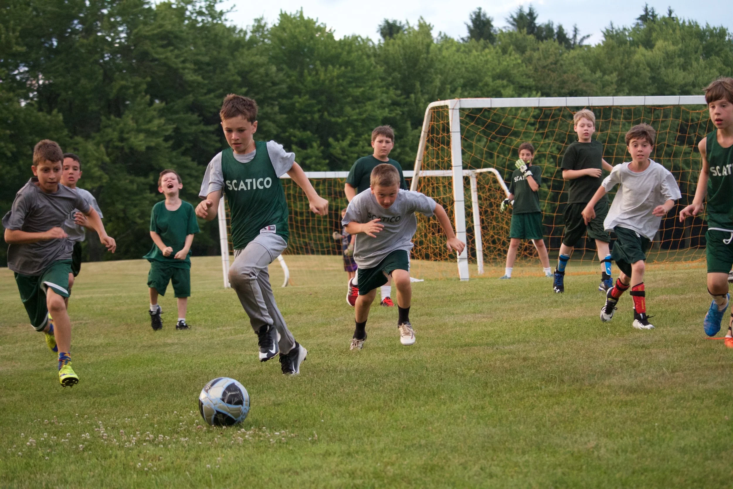 Lowe Hill Soccer League ( Oz zeroing in on the ball). 