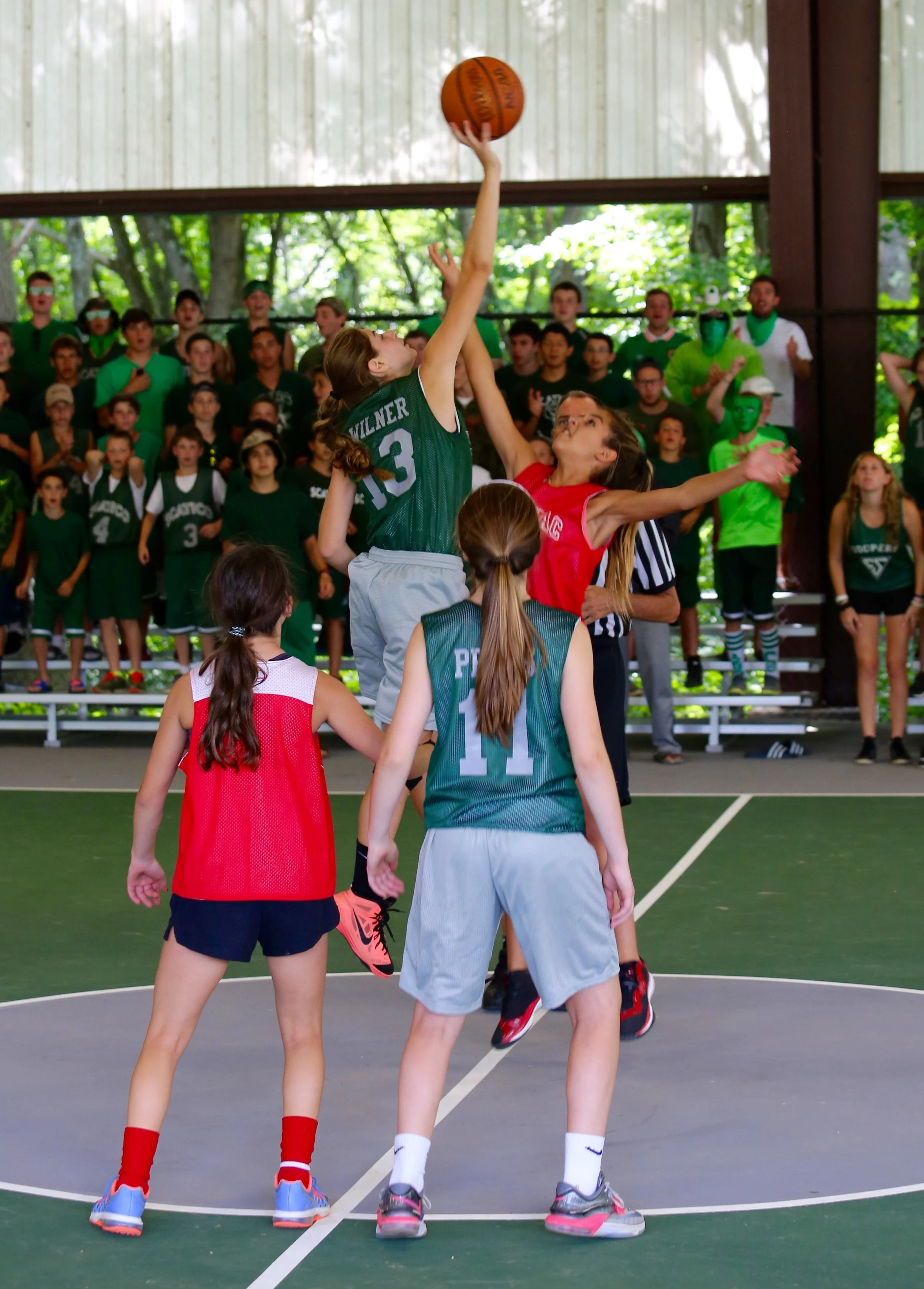 Opening tip of the girls' Nat Holman Basketball Tournament ( Kasey showing some hops). 