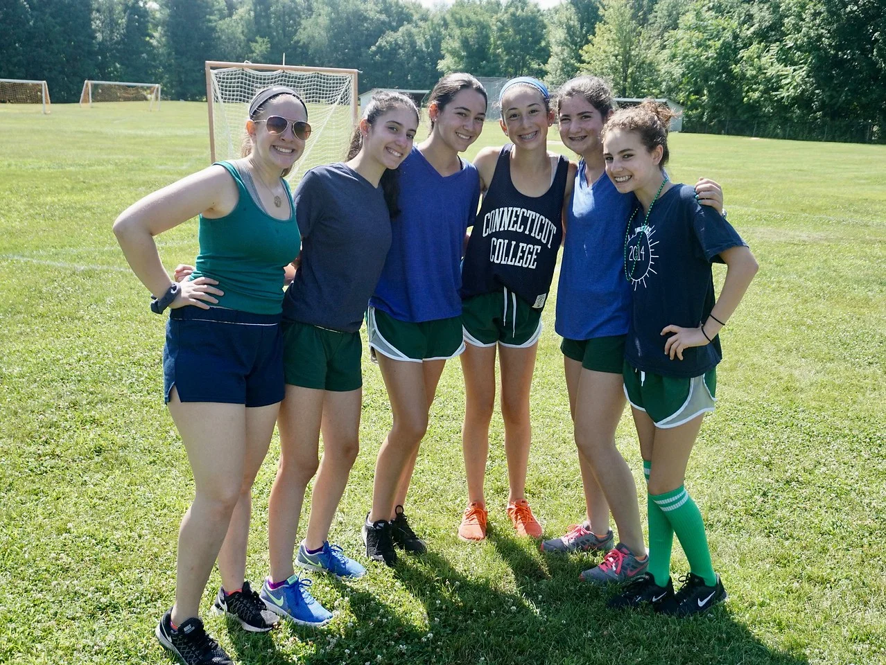 Senior girls take a time out from Tribes and smile for the camera