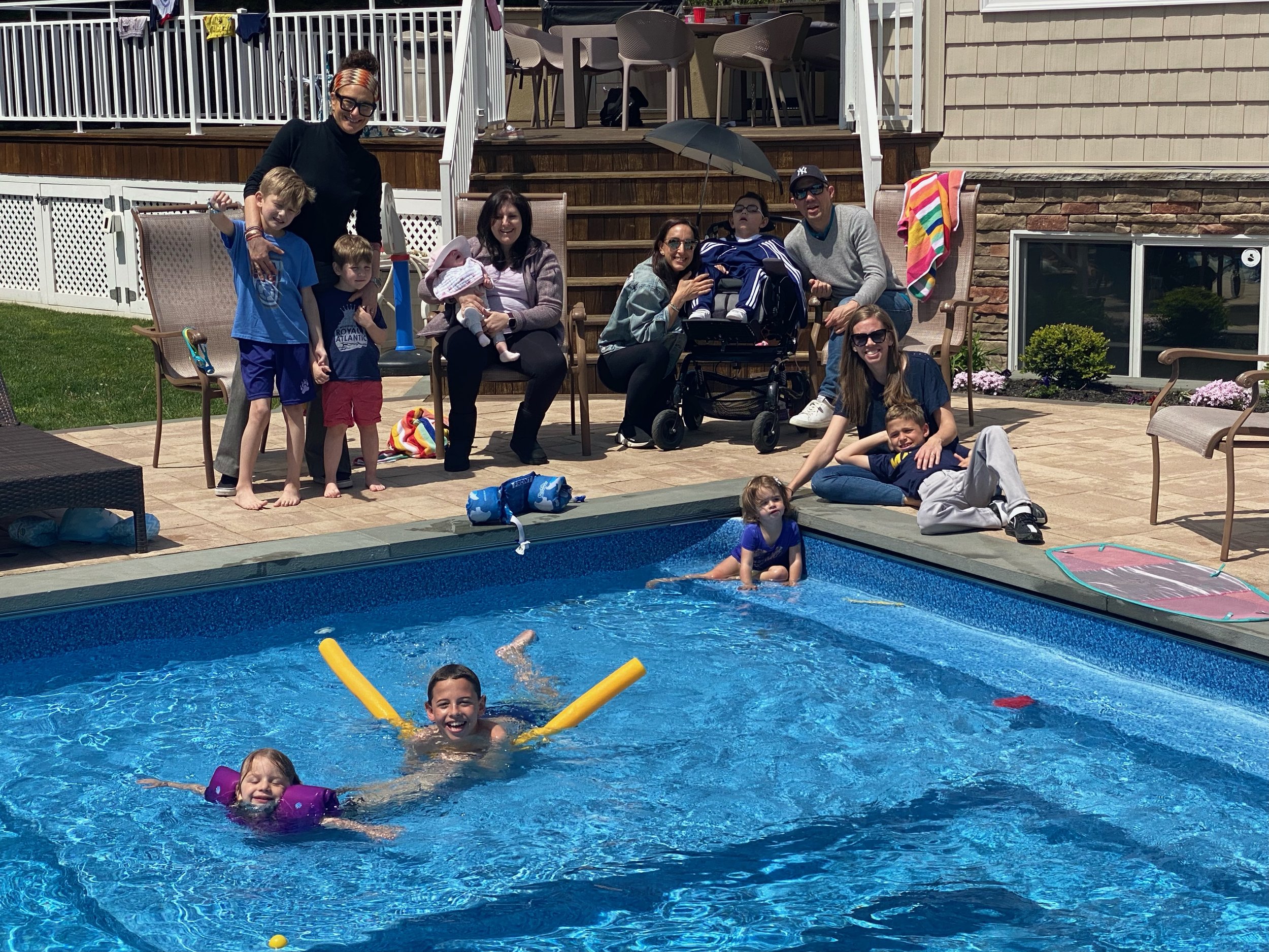 1996 Soopers and families at a spring pool party: Erica Rothman. Meri Brown, Deborah Ben-David, and Randi Schwartz Gross.