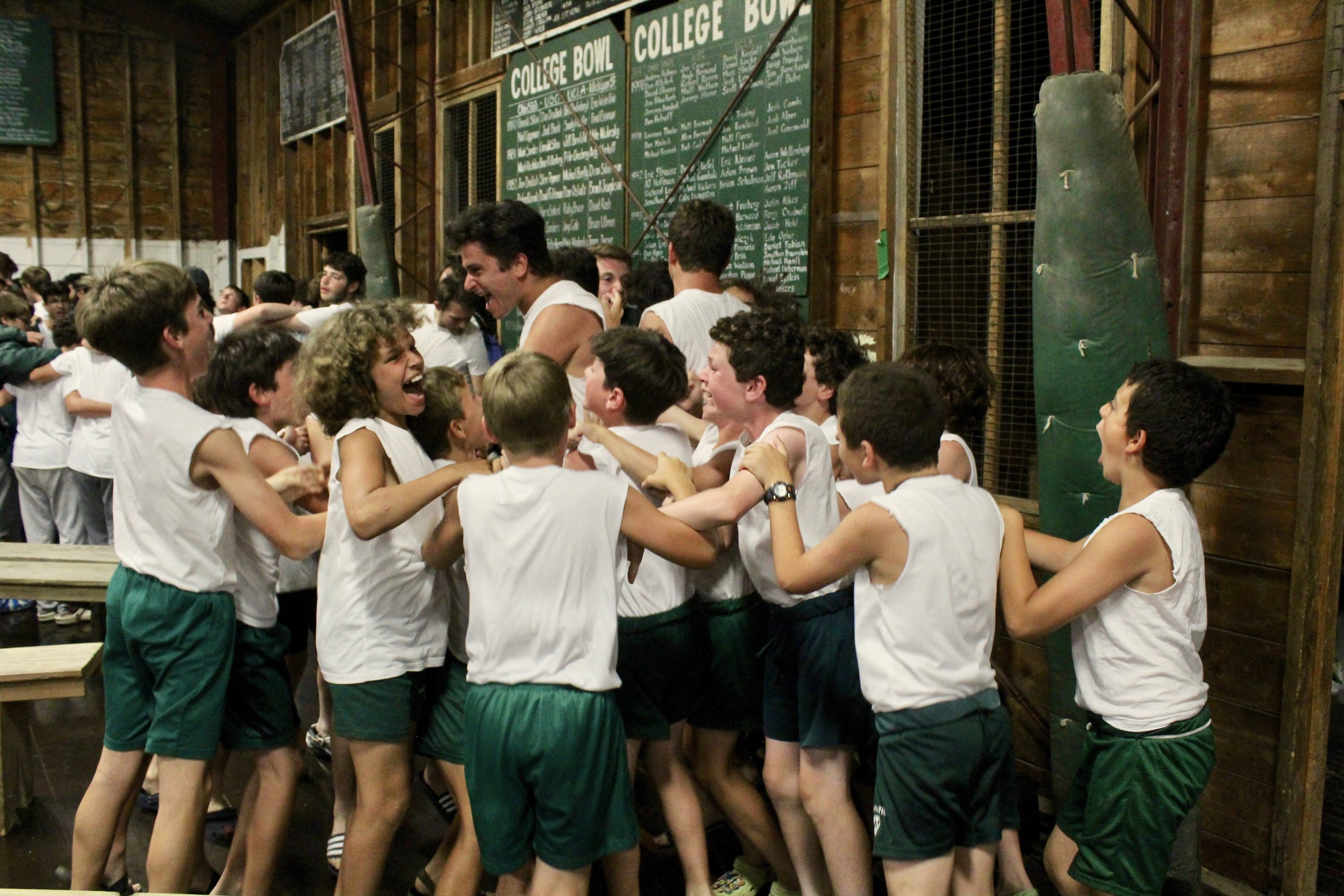  Division Leader Manny Jacobson celebrates a Sing victory with the Sub Juniors. 