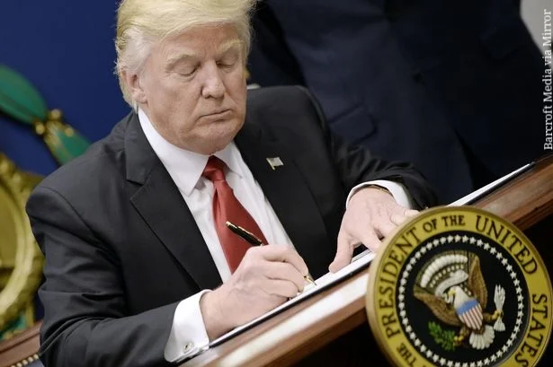 Trump Bans Muslims With One Wave of His Pen