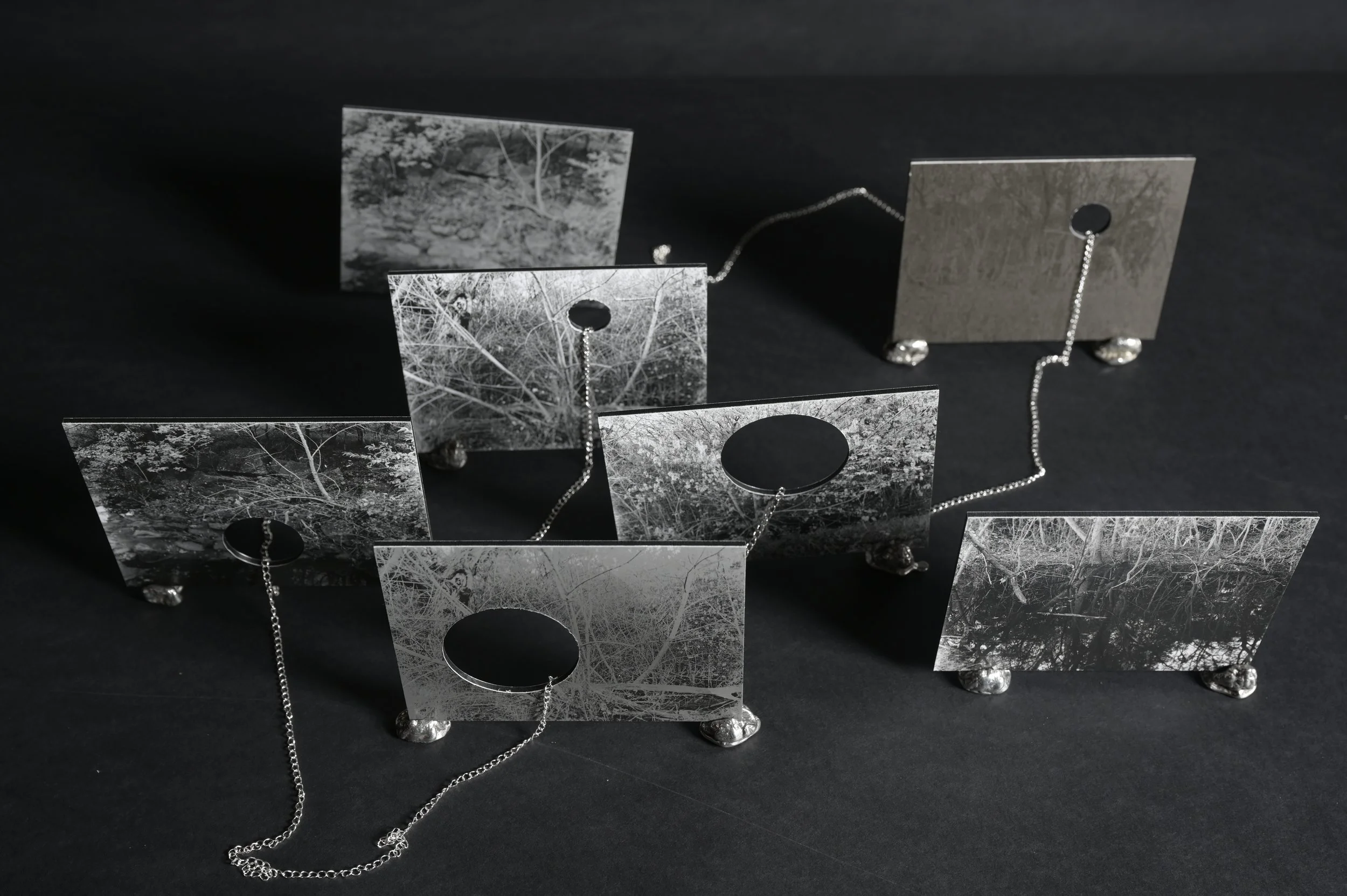   No matter what we do we always fuck it up in the end,  silver gelatin prints, Di-bond, silver coated chain, pewter casts of Juicy Fruit chewing gum chewed by the artist, dimensions variable,   2023  