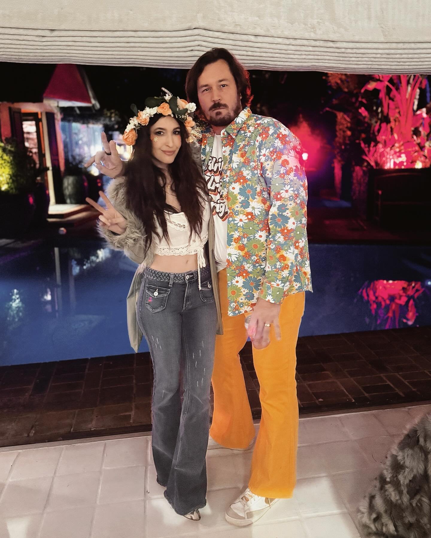 Happy Valentine&rsquo;s to the guy who&rsquo;s unafraid to lean hard into a theme party with me 🌸🌼🌻 Yellow bell bottoms are not NOT your look @bretthughes6 ❤️