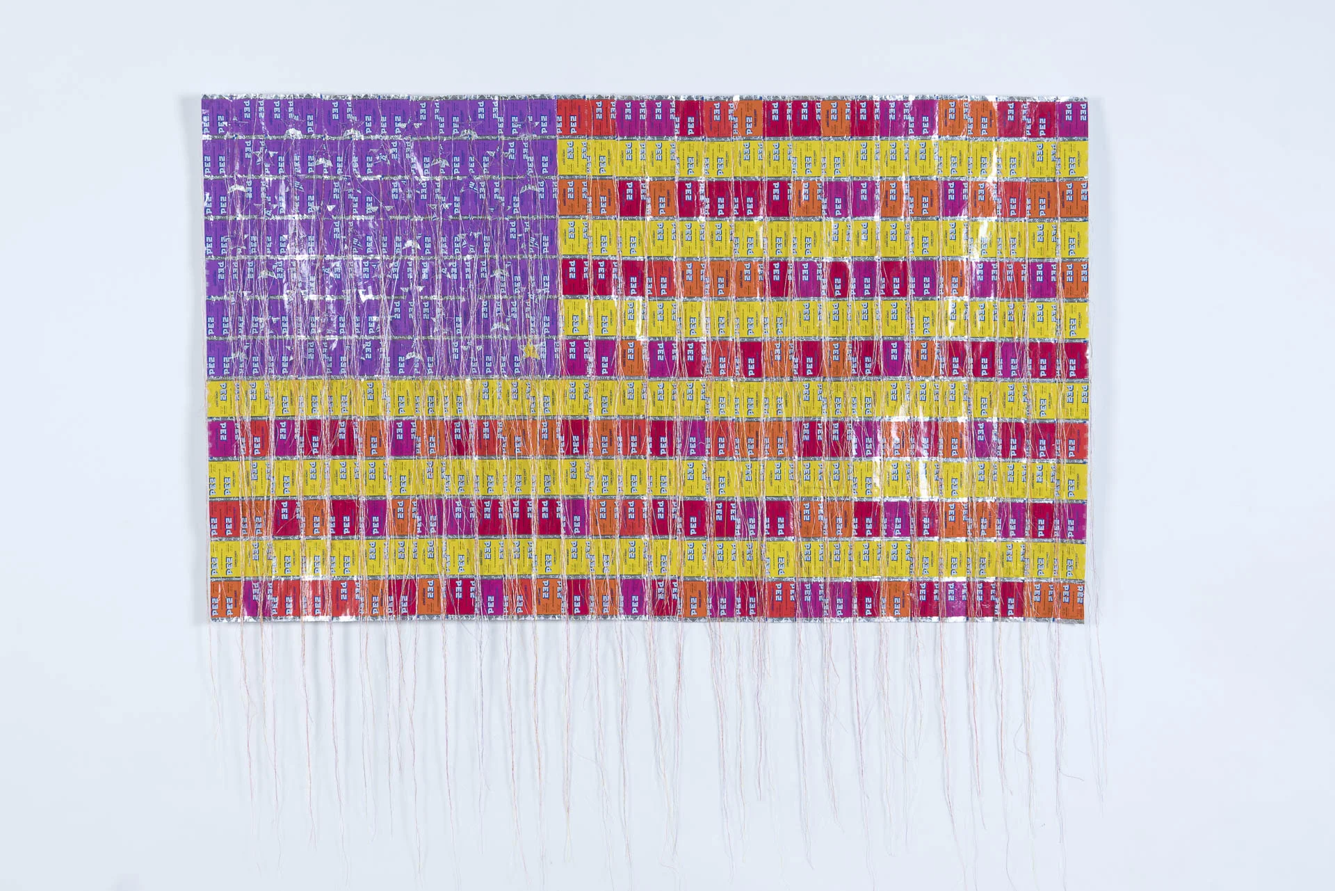   The 50 States Journey: HI , PEZ wrapper and thread, 55 x 33 in,&nbsp;2016 