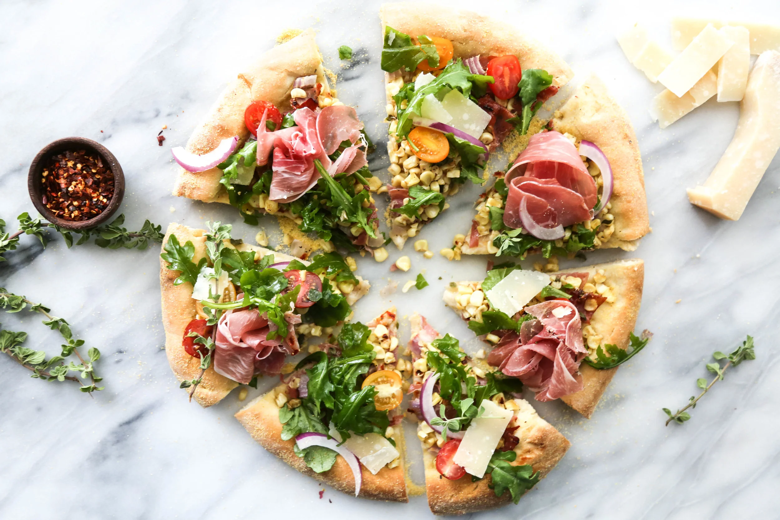 Sweet Corn, Prosciutto, & Arugula Pizza