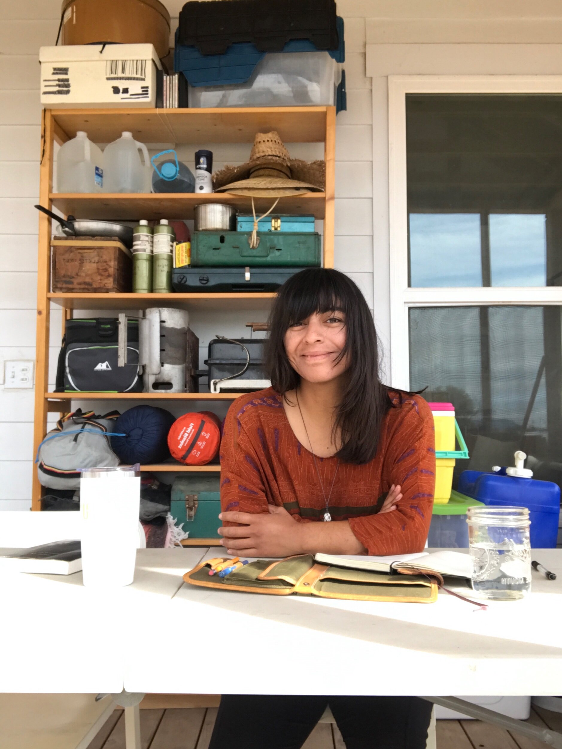 Blanca working in the back porch of Epicenter housing
