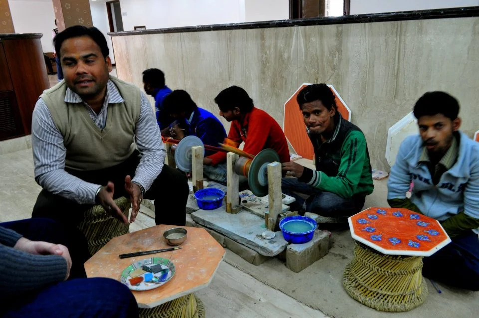 We were tired, sleepy and hungry and our Agra tour guide insisted on taking us to this marble factory. This man started with 'How are you today?' We replied, 'Tired, sleepy and hungry and I don't want to be sold anything.' And then he continued on with his sales talk. 