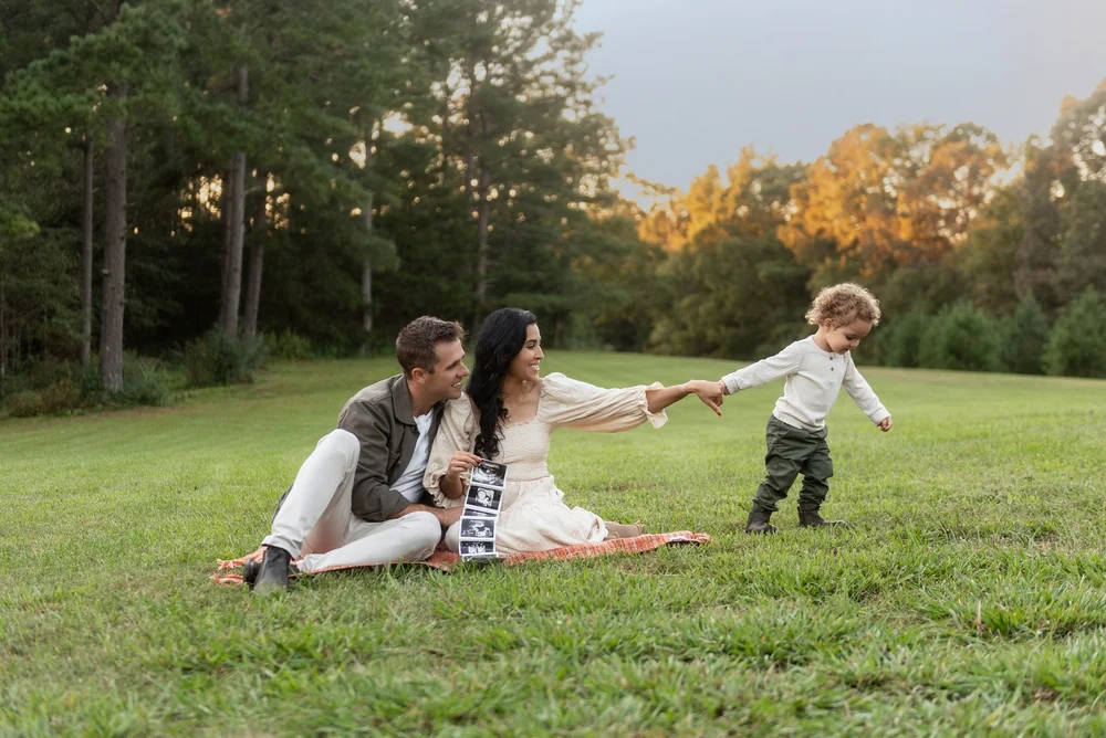 Family storytelling portrait session with parents and child