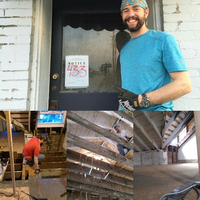 Mark Huebbe in front of the building as it stood before extensive repairs.