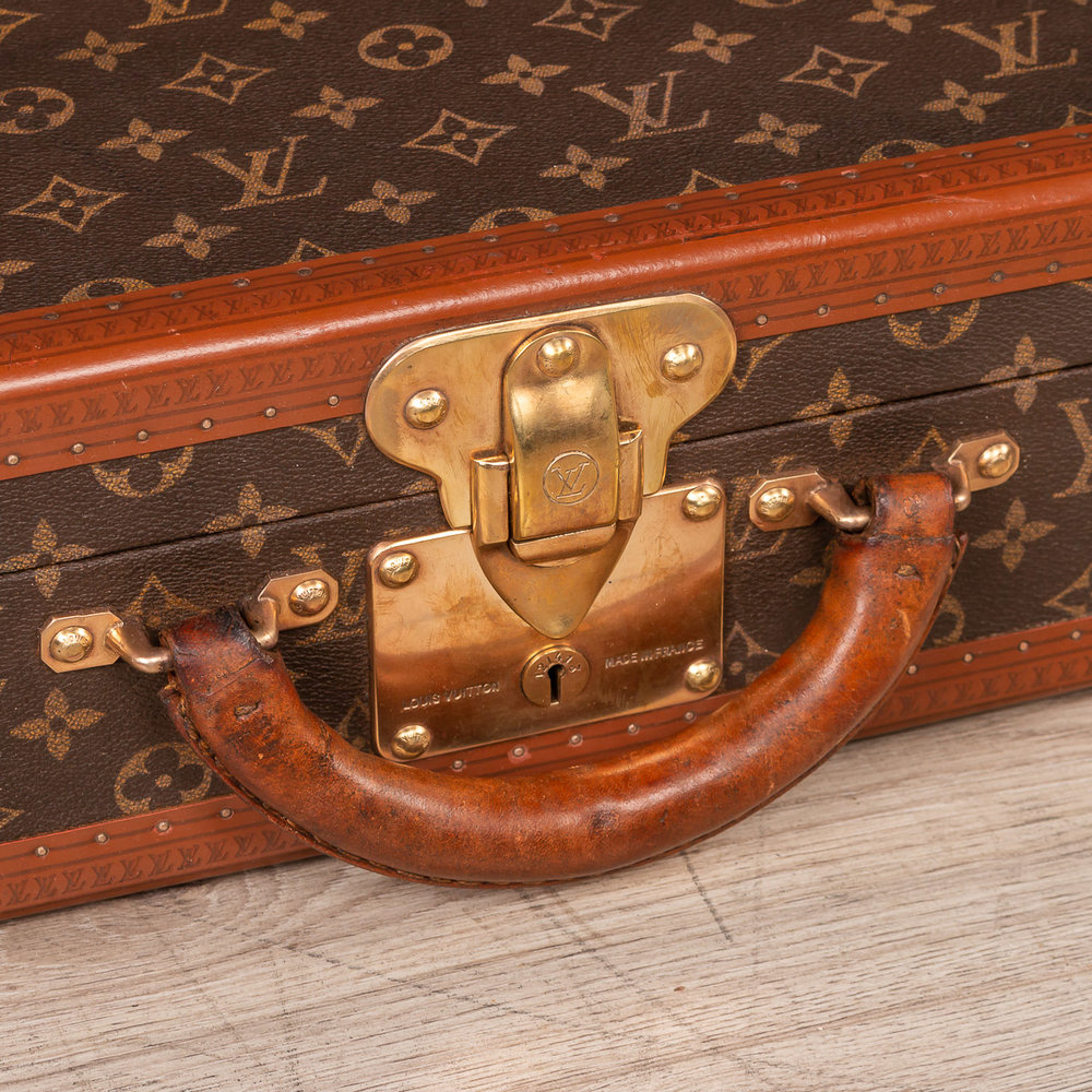 Past auction: Louis Vuitton hard sided suitcase late 20th century