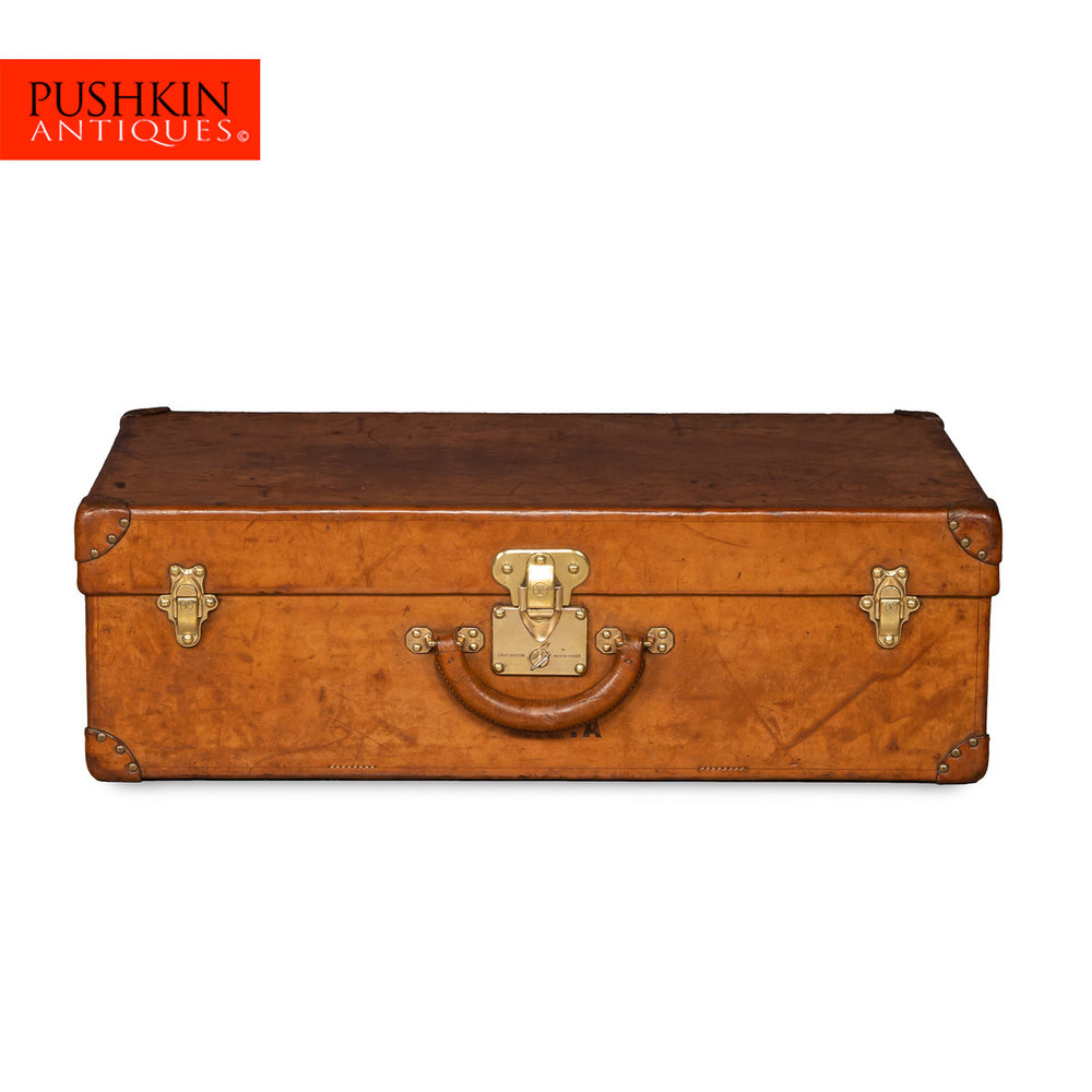 Lot - Louis Vuitton, (1821-1892, French), A vintage small Breveté suitcase  trunk, circa 1926-1954, Interior embossed paper label (damaged): P