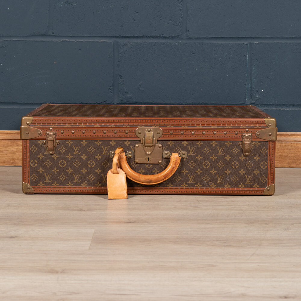 Past auction: Two small zip Louis Vuitton travel cases 1970s