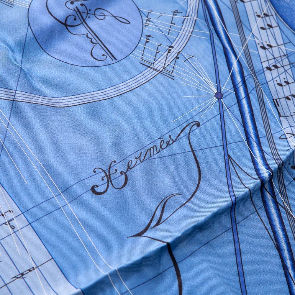 A SILK HERMES SCARF IN THE ORIGINAL BOX, FRANCE, OF RECENT