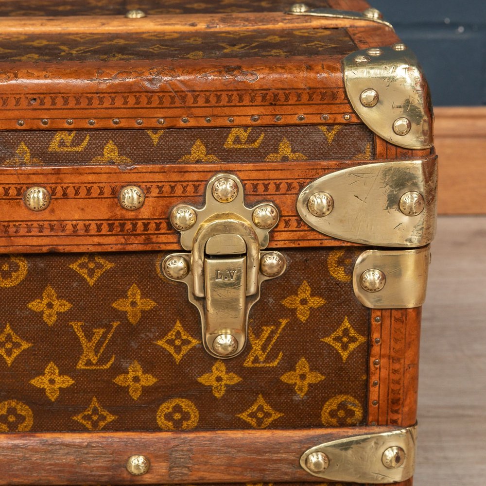 A HIGH TRUNK IN MONOGRAM CANVAS