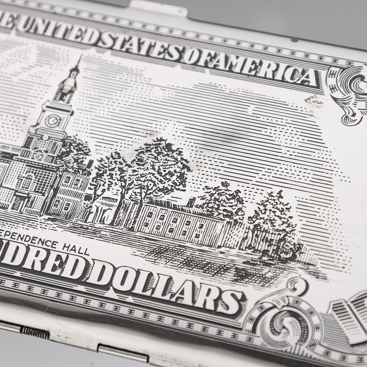 PUSHKINS.COM - J11197 - 20thC AMERICAN SILVER-PLATED CIGARETTE CASE & LIGHTER SHAPED AS A HUNDRED DOLLAR BILL - 31.jpg