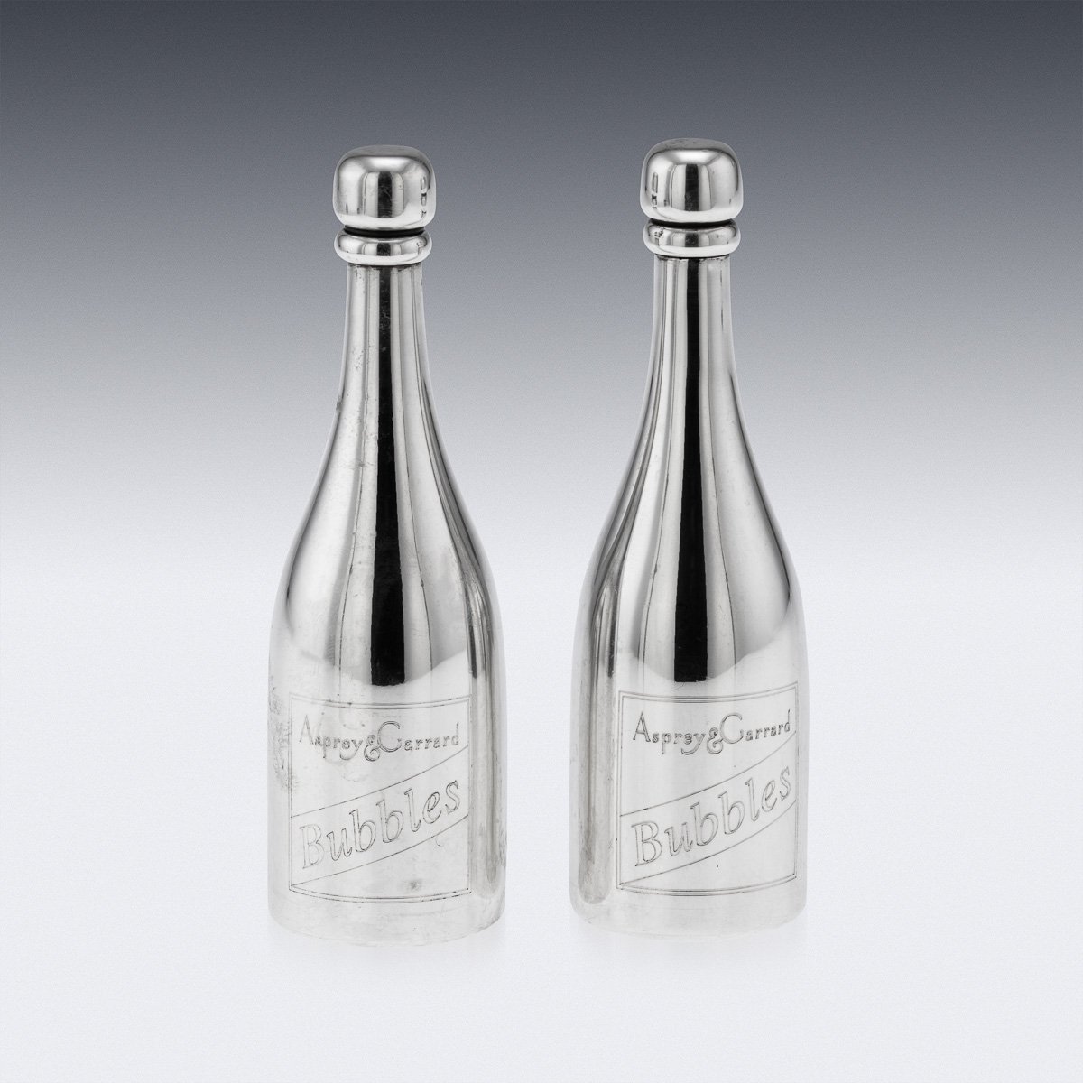 PUSHKINS.COM - J12505 - 21stC PAIR OF SILVER "CHAMPAGNE BOTTLE" BUBBLE BLOWERS, ASPREY & GARRARD, c.2000 -  04.jpg