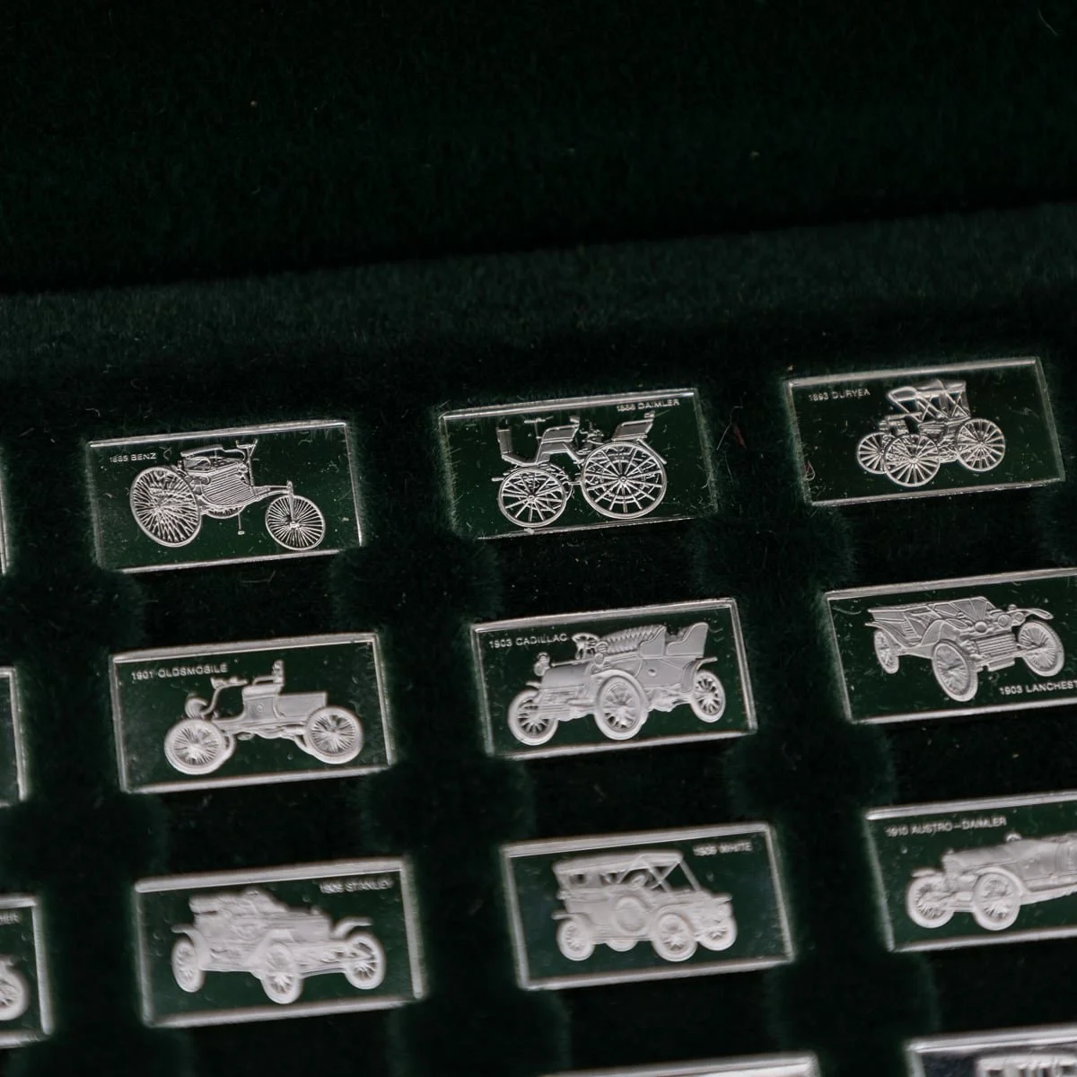 PUSHKINS.COM - 20thC ENGLISH SOLID SILVER %22100 GREATEST CARS%22 CASED INGOTS & BOOK - 37.jpg