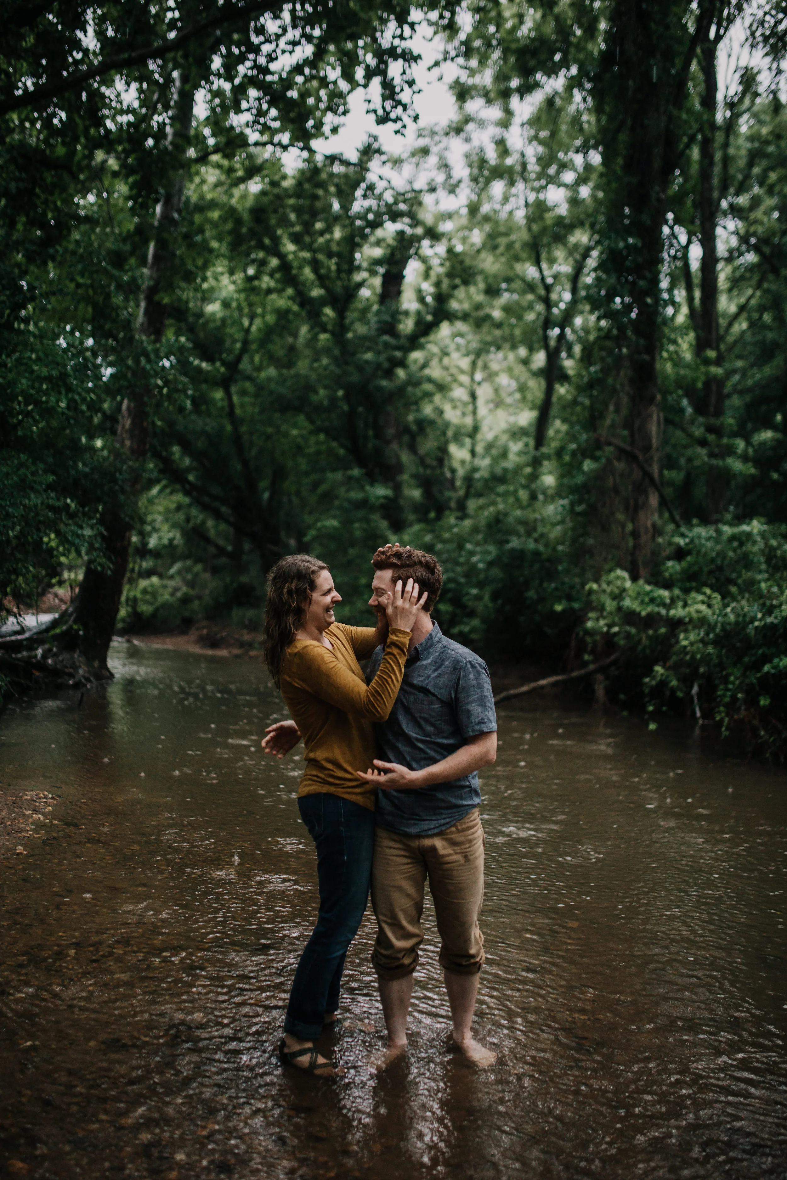 Engagement portrait of Maryland couple outside at a park.