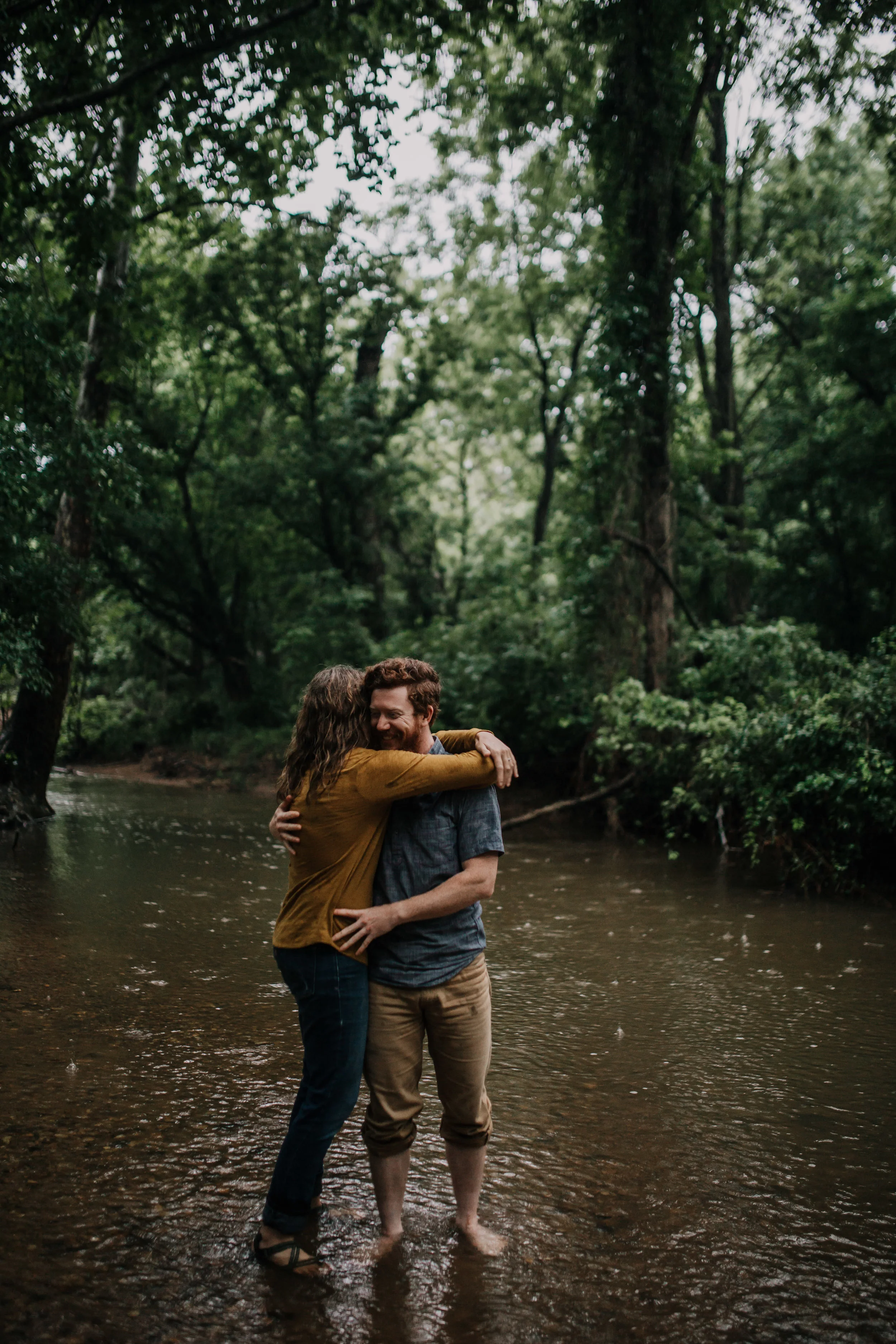 Engagement portrait of Maryland couple outside at a park.