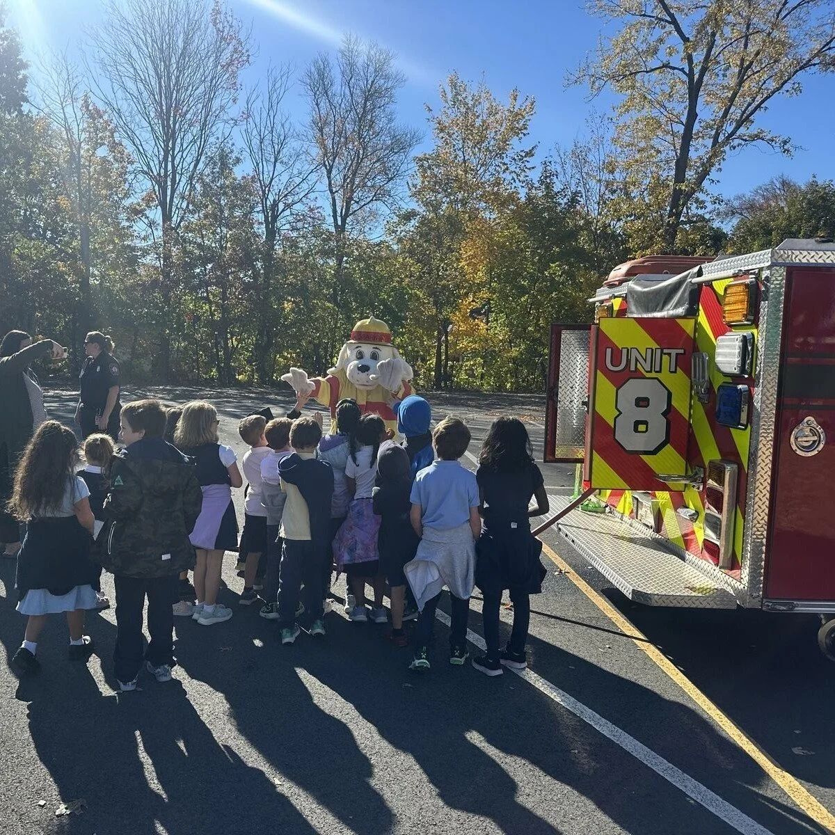 The Manchester Fire Department visited our school this week for a Fire Prevention Assembly! 🚒🔥
Our younger students were thrilled to meet Sparky the Firedog and spray the fire hose at a mini demonstration house. Older elementary students got to hea