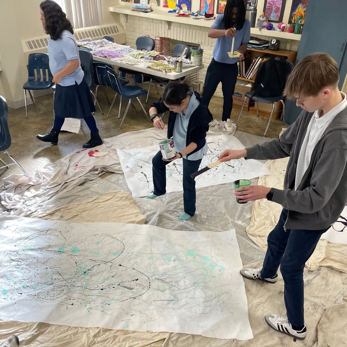 Drips, splatters, movement, and teamwork! 🎨
Our high school art class experimented with Jackson Pollock&ndash;inspired &ldquo;action painting,&rdquo; creating large-scale collaborative murals on canvases laid out on the floor. Big energy, big creati