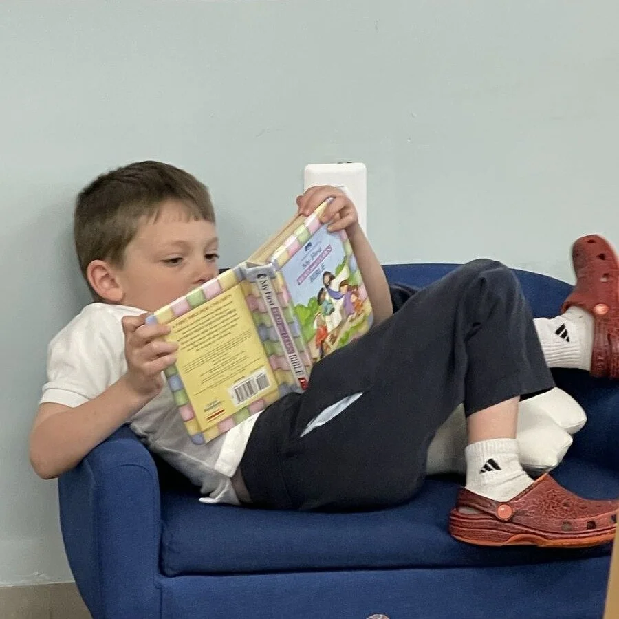 Our Elementary students joyfully celebrated Read Across America this month with a fun, school-wide Mystery Reader Challenge! Dr. Baker kicked off the morning by reminding us that reading is a gift from God, as Mystery Readers read stories over the in