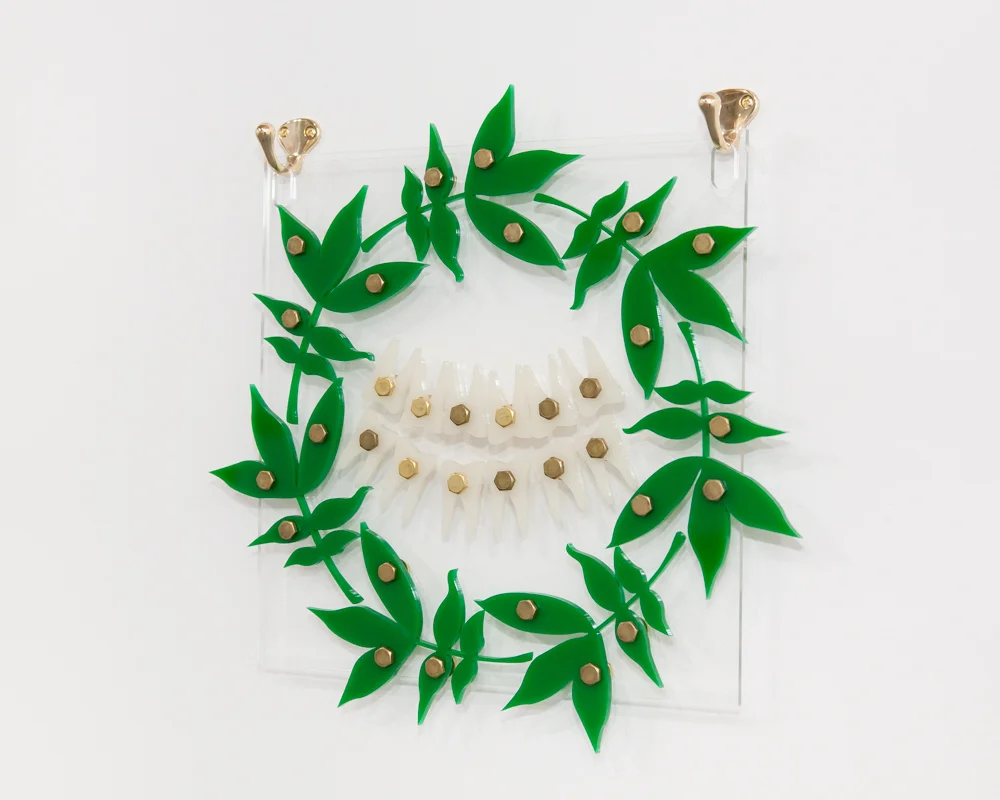 Toothy Smile (Blackamoors Collage #15), 2015 Plexiglass and Brass 14.6 x 14.8 inches