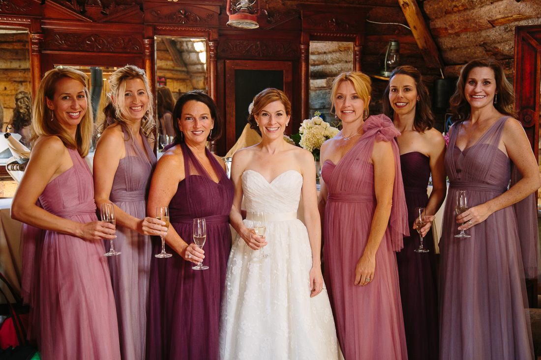 Cat Mayer Studio | http://www.catmayerstudio.com | Gorrono Ranch Wedding Photographer | Bridesmaids in Saloon wearing pink and purple Amsale dresses