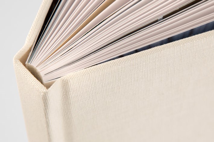 Portrait albums feature hard, board-like pages.