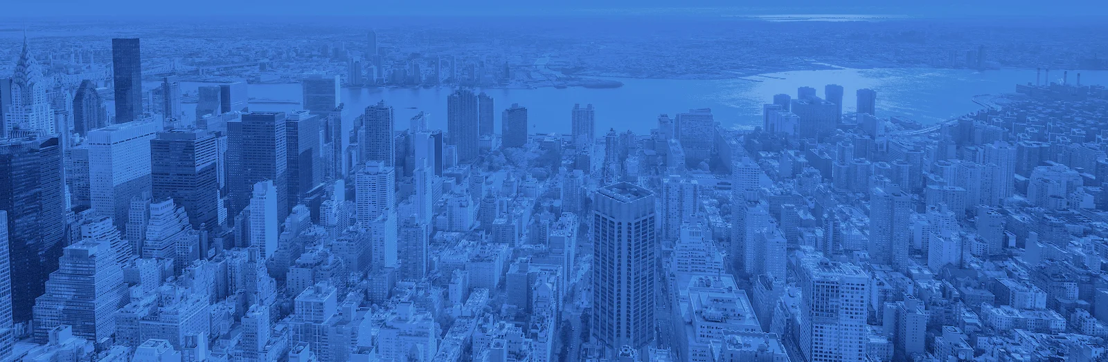bigstock-Dawn-View-Of-The-Lower-East-Si-238334908 blue3.jpg