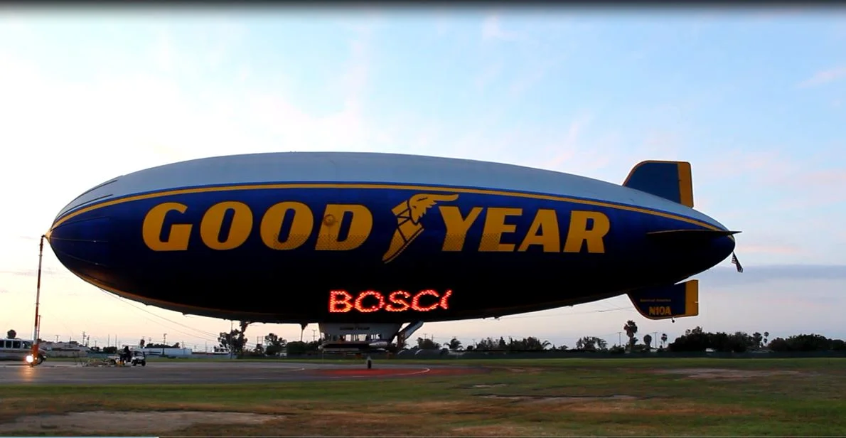Goodyear blimps flies over St. John Bosco