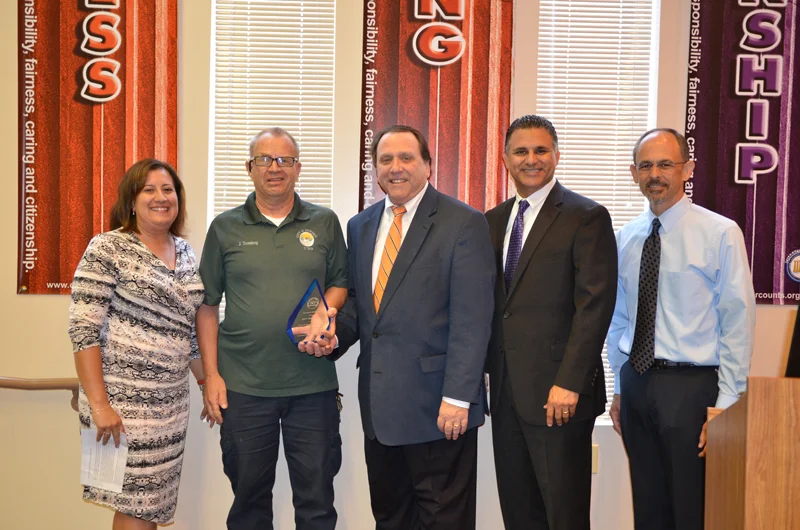 Retired police officer honored for volunteer work