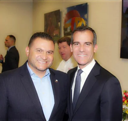 Downey Mayor Luis Marquez, left, and Los Angeles Mayor Eric Garcetti.