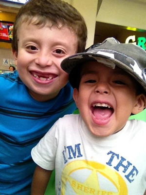 Kevin Sandoval, left, with his brother