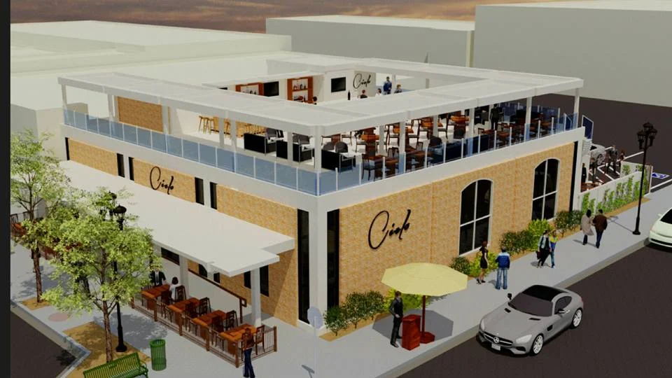 Upscale restaurant with a rooftop lounge approved for downtown