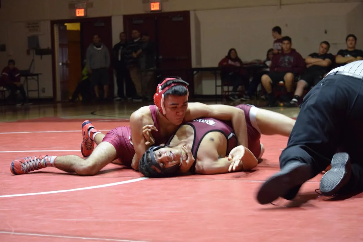 Sports Briefs: Downey wrestlers win third straight title