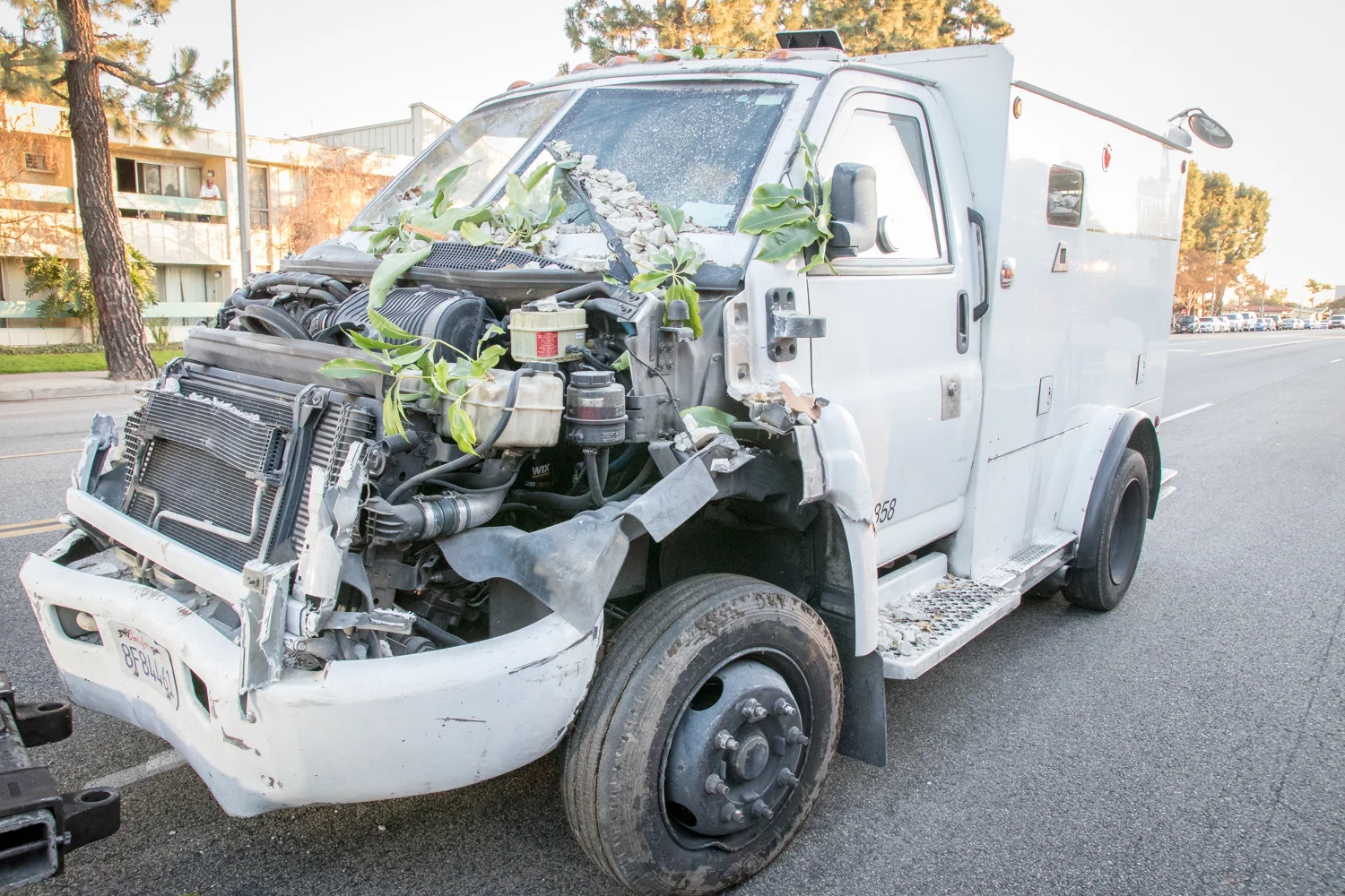 Family avoids injury after armored truck crashes into apartment