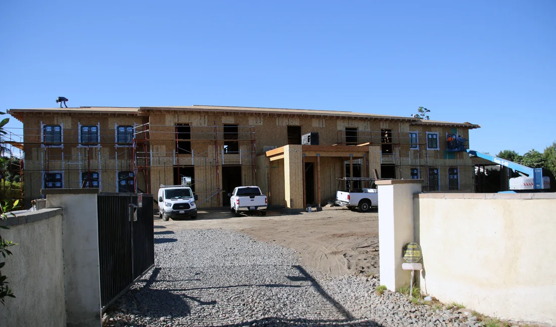 A new home measuring nearly 15,000 square feet is under construction at 9400 Florence Ave. Photo by Alex Dominguez