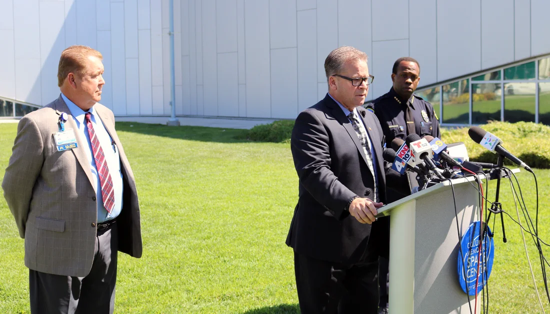 Downey Police Capt. Mark McDaniel addresses reporters as a press conference. Photo by Alex Dominguez