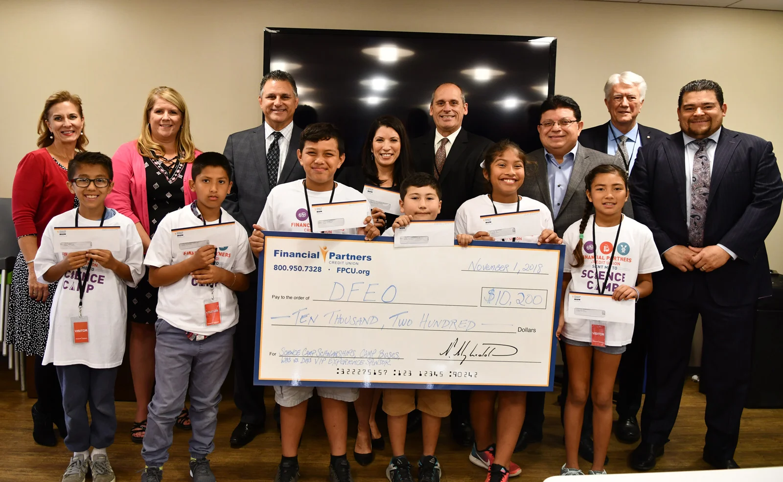 Financial Partners gives $7,700 to send students to science camp