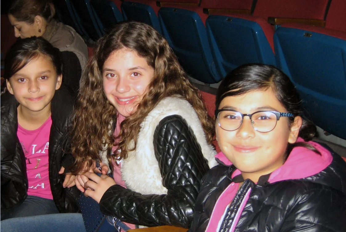 Middler schoolers Emma, Meghan and Jenna at Saturday’s Downey Symphony concert. Photo by Lorine Parks