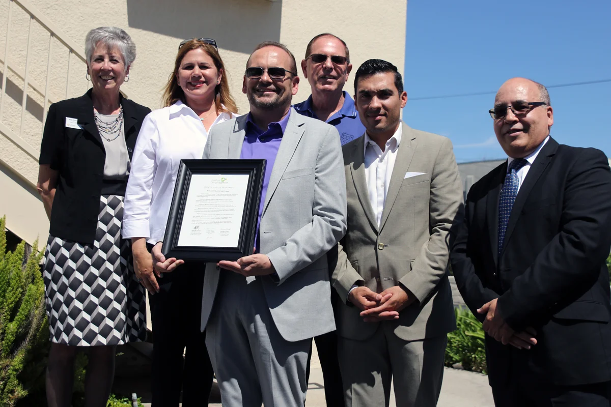 From left: Clarissa Ritter, vice president of marketing and communications for Inclusiv; Giggy Perez-Saab, DFCU board member; Ray Mesler, DFCU president and CEO; Stan Hanstad, DFCU board member; Tyrone Conde, DFCU vice president of marketing; and Pablo DeFilippi, senior vice president of membership and network engagement for Inclusiv. Photo by Eric Pierce