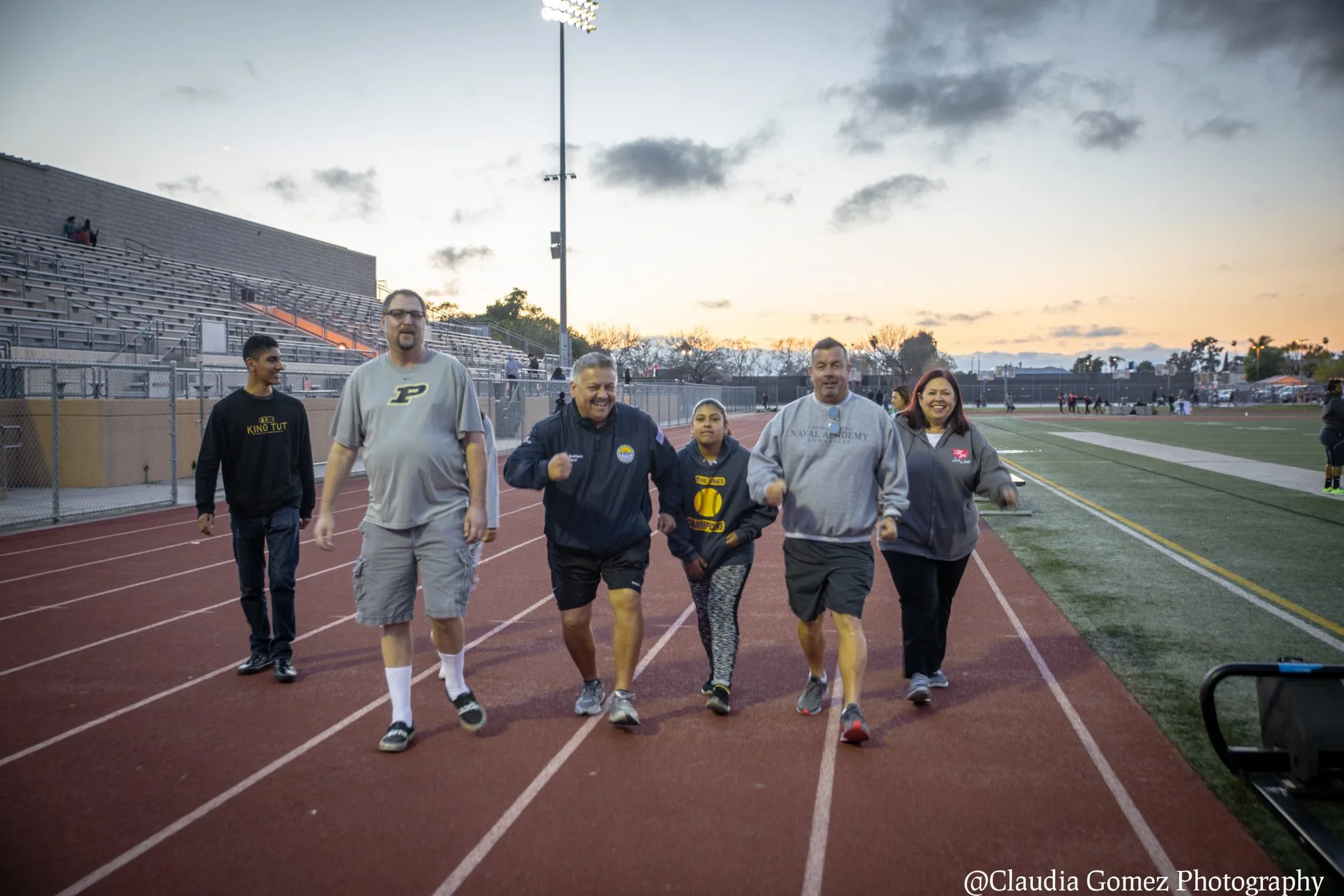 Mayor Rick Rodriguez leads a walk on the Downey High School track. Photo by Claudia Gomez