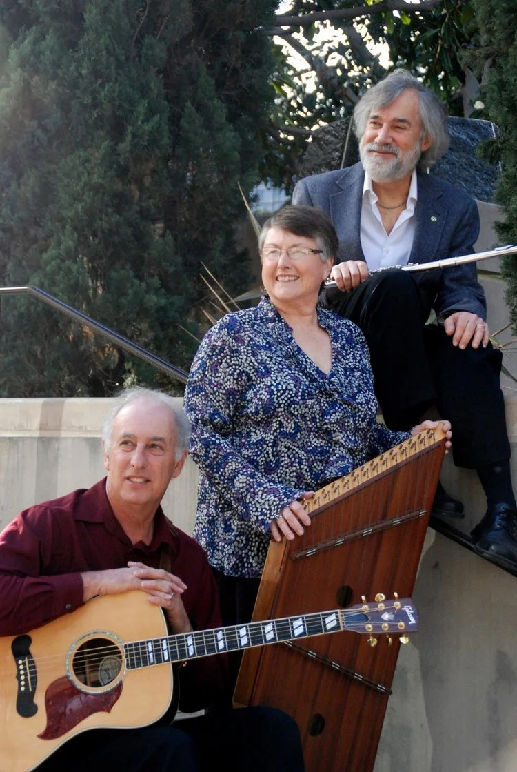 Bea Romano, center, wither her band, When Pigs Fly. She died July 22.