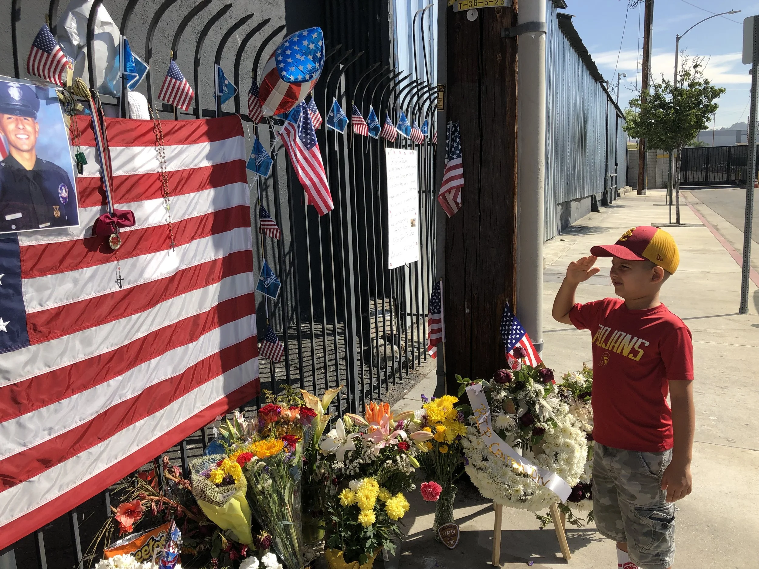 6-year-old boy organizes backpack giveaway to honor slain police officer