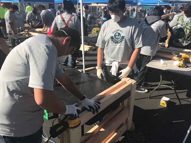 Warren High students build 100 bunk beds for wildfire victims