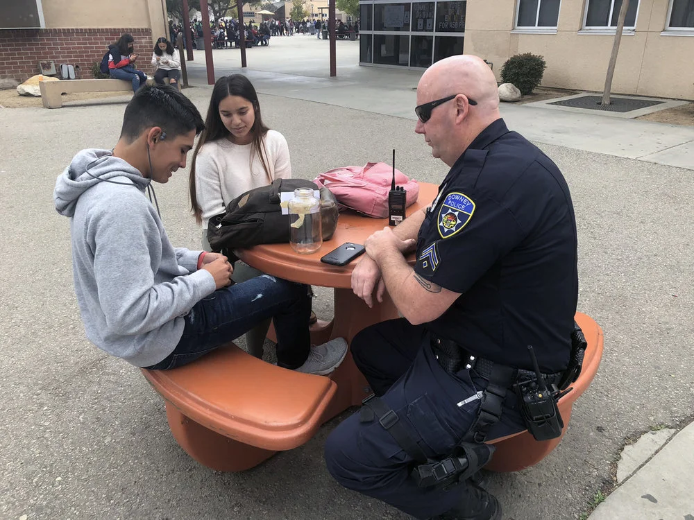 Downey police officers return to high school campuses